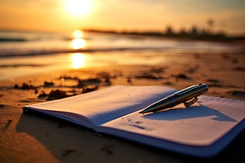 Journal on the sand at the beach